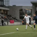 Spillere i aksjon under Eliteserien-kamp, fotball på tv 2026